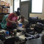 Scientists work in the lab preparing for fieldwork